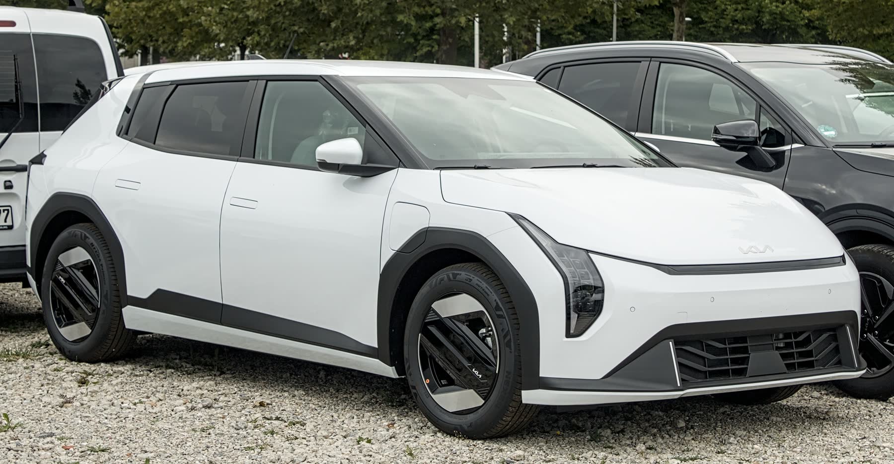 White electric hatchback with black alloy wheels